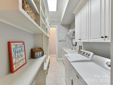 Discover the epitome of luxury living in this stunning executive on Ballantyne Resort and Country Club in North Carolina - for sale on GolfHomes.com, golf home, golf lot
