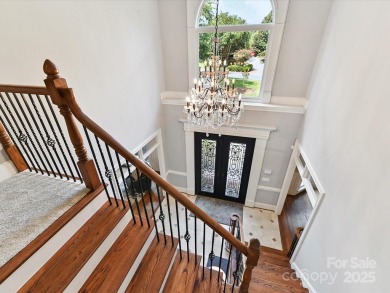 Discover the epitome of luxury living in this stunning executive on Ballantyne Resort and Country Club in North Carolina - for sale on GolfHomes.com, golf home, golf lot