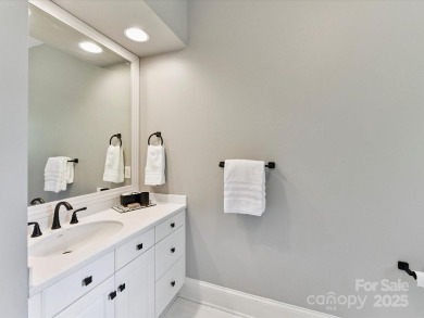 Discover the epitome of luxury living in this stunning executive on Ballantyne Resort and Country Club in North Carolina - for sale on GolfHomes.com, golf home, golf lot