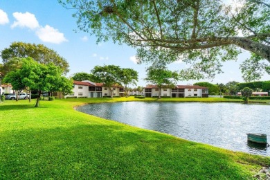 FULLY UPGRADED WATERFRONT FIRST FLOOR UNIT IN SOUGHT AFTER on Boca Lago Golf and Country Club in Florida - for sale on GolfHomes.com, golf home, golf lot