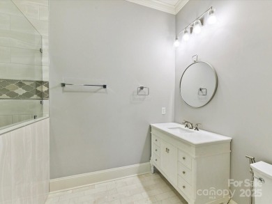 Discover the epitome of luxury living in this stunning executive on Ballantyne Resort and Country Club in North Carolina - for sale on GolfHomes.com, golf home, golf lot