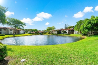 FULLY UPGRADED WATERFRONT FIRST FLOOR UNIT IN SOUGHT AFTER on Boca Lago Golf and Country Club in Florida - for sale on GolfHomes.com, golf home, golf lot