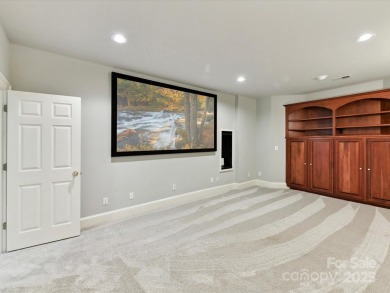 Discover the epitome of luxury living in this stunning executive on Ballantyne Resort and Country Club in North Carolina - for sale on GolfHomes.com, golf home, golf lot