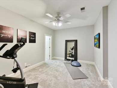 Discover the epitome of luxury living in this stunning executive on Ballantyne Resort and Country Club in North Carolina - for sale on GolfHomes.com, golf home, golf lot