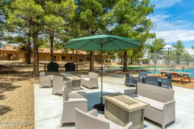 Lovely home, new outside paint, Large screened in AZ room 12x24 on Pine Shadows Golf Course in Arizona - for sale on GolfHomes.com, golf home, golf lot