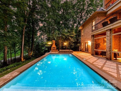 Discover the epitome of luxury living in this stunning executive on Ballantyne Resort and Country Club in North Carolina - for sale on GolfHomes.com, golf home, golf lot