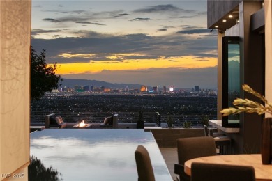 Wow! This ultra-modern FULLY CUSTOM MASTERPIECE offers on Dragon Ridge Country Club in Nevada - for sale on GolfHomes.com, golf home, golf lot