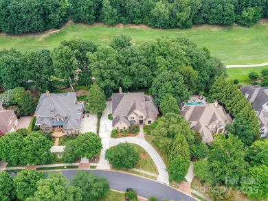 Discover the epitome of luxury living in this stunning executive on Ballantyne Resort and Country Club in North Carolina - for sale on GolfHomes.com, golf home, golf lot