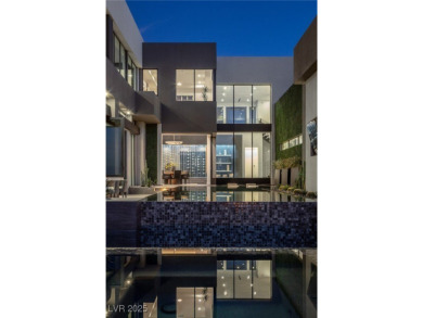 Wow! This ultra-modern FULLY CUSTOM MASTERPIECE offers on Dragon Ridge Country Club in Nevada - for sale on GolfHomes.com, golf home, golf lot