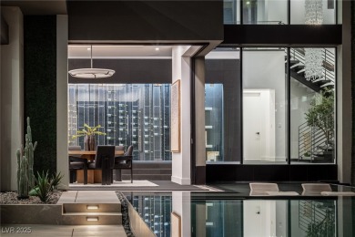 Wow! This ultra-modern FULLY CUSTOM MASTERPIECE offers on Dragon Ridge Country Club in Nevada - for sale on GolfHomes.com, golf home, golf lot
