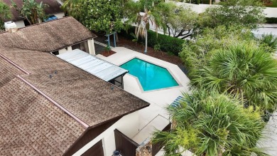 Located on a private corner lot in the highly sought-after on Carrollwood Country Club in Florida - for sale on GolfHomes.com, golf home, golf lot