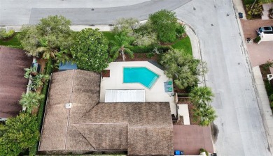 Located on a private corner lot in the highly sought-after on Carrollwood Country Club in Florida - for sale on GolfHomes.com, golf home, golf lot