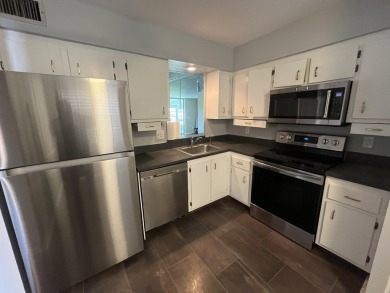 Welcome home to your oversized 2/2 3rd floor true corner condo on Marina Lakes Golf Course in Florida - for sale on GolfHomes.com, golf home, golf lot