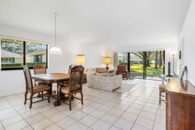 Welcome to 605 Club Drive--a light-filled 2-bedroom, 2-bath on PGA National Golf Club in Florida - for sale on GolfHomes.com, golf home, golf lot