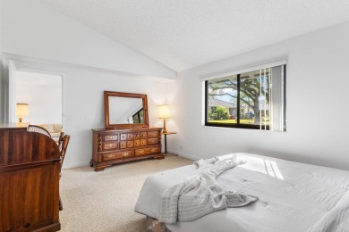 Welcome to 605 Club Drive--a light-filled 2-bedroom, 2-bath on PGA National Golf Club in Florida - for sale on GolfHomes.com, golf home, golf lot
