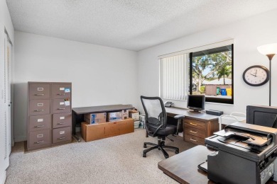 Welcome to 605 Club Drive--a light-filled 2-bedroom, 2-bath on PGA National Golf Club in Florida - for sale on GolfHomes.com, golf home, golf lot
