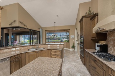 Stunning WATERFRONT custom pool home located in desirable deed on Saint Andrews South Golf Club in Florida - for sale on GolfHomes.com, golf home, golf lot
