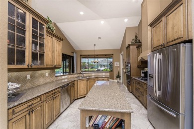 Stunning WATERFRONT custom pool home located in desirable deed on Saint Andrews South Golf Club in Florida - for sale on GolfHomes.com, golf home, golf lot