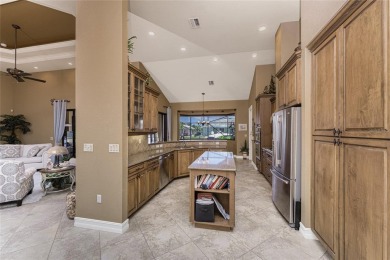 Stunning WATERFRONT custom pool home located in desirable deed on Saint Andrews South Golf Club in Florida - for sale on GolfHomes.com, golf home, golf lot