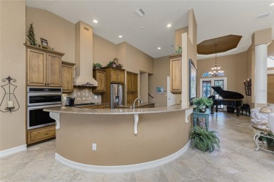 Stunning WATERFRONT custom pool home located in desirable deed on Saint Andrews South Golf Club in Florida - for sale on GolfHomes.com, golf home, golf lot