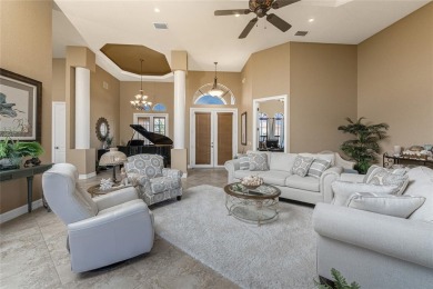 Stunning WATERFRONT custom pool home located in desirable deed on Saint Andrews South Golf Club in Florida - for sale on GolfHomes.com, golf home, golf lot