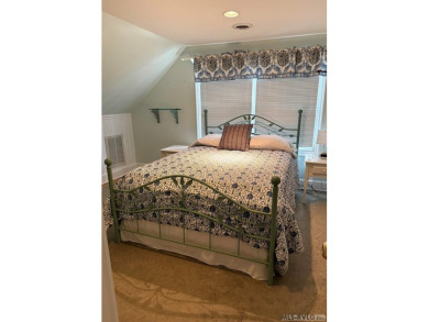 Discover unparalleled lakefront living in the coveted Tanglewood on Tanglewood Shores Golf Club in Virginia - for sale on GolfHomes.com, golf home, golf lot