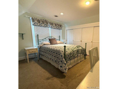 Discover unparalleled lakefront living in the coveted Tanglewood on Tanglewood Shores Golf Club in Virginia - for sale on GolfHomes.com, golf home, golf lot