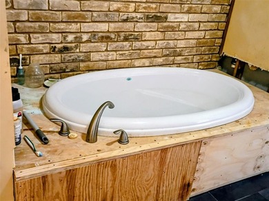 This spacious 3,187 Sq Ft gem is nestled in the prestigious on Woodhaven Country Club in Texas - for sale on GolfHomes.com, golf home, golf lot