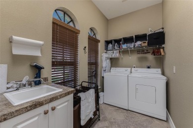 Stunning WATERFRONT custom pool home located in desirable deed on Saint Andrews South Golf Club in Florida - for sale on GolfHomes.com, golf home, golf lot