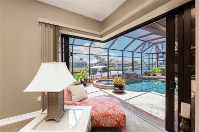 Stunning WATERFRONT custom pool home located in desirable deed on Saint Andrews South Golf Club in Florida - for sale on GolfHomes.com, golf home, golf lot
