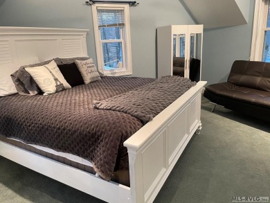Discover unparalleled lakefront living in the coveted Tanglewood on Tanglewood Shores Golf Club in Virginia - for sale on GolfHomes.com, golf home, golf lot