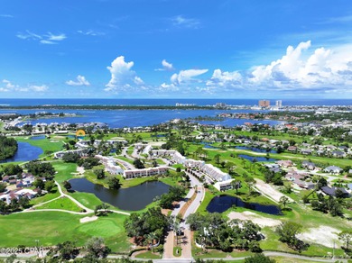 This ground-level, end unit golf villa with NO STEPS in the on Bay Point Resort Golf Club in Florida - for sale on GolfHomes.com, golf home, golf lot