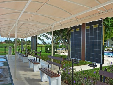 Beautiful first-floor condo in a desirable 55+ community with on The American Golf Club in Florida - for sale on GolfHomes.com, golf home, golf lot