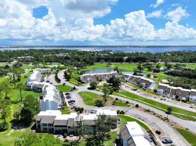 This ground-level, end unit golf villa with NO STEPS in the on Bay Point Resort Golf Club in Florida - for sale on GolfHomes.com, golf home, golf lot