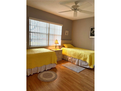 Beautiful first-floor condo in a desirable 55+ community with on The American Golf Club in Florida - for sale on GolfHomes.com, golf home, golf lot