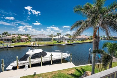 Stunning WATERFRONT custom pool home located in desirable deed on Saint Andrews South Golf Club in Florida - for sale on GolfHomes.com, golf home, golf lot