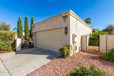 A charming garden home with a popular floor plan. Includes both on Arizona Grand Resort Golf Course in Arizona - for sale on GolfHomes.com, golf home, golf lot