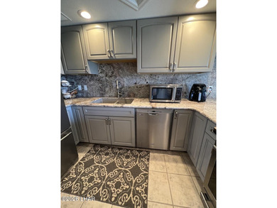 WE HAVE SEVERAL CONDOS FOR SALE AT QUEENS BAY PRICED FROM $365K on London Bridge Golf Course in Arizona - for sale on GolfHomes.com, golf home, golf lot