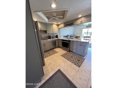 WE HAVE SEVERAL CONDOS FOR SALE AT QUEENS BAY PRICED FROM $365K on London Bridge Golf Course in Arizona - for sale on GolfHomes.com, golf home, golf lot