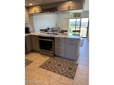 WE HAVE SEVERAL CONDOS FOR SALE AT QUEENS BAY PRICED FROM $365K on London Bridge Golf Course in Arizona - for sale on GolfHomes.com, golf home, golf lot