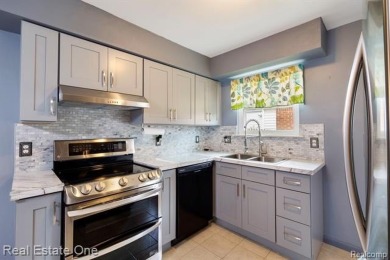 GORGEOUS, UPDATED RANCH...JUST PACK YOUR BAGS THE UPDATES HAVE on Westland Municipal Golf Course in Michigan - for sale on GolfHomes.com, golf home, golf lot