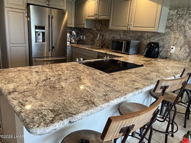 WE HAVE SEVERAL CONDOS FOR SALE AT QUEENS BAY PRICED FROM $365K on London Bridge Golf Course in Arizona - for sale on GolfHomes.com, golf home, golf lot