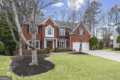 Welcome home to this 6-bedroom, 4-bath home tucked away on a on The Golf Club of Georgia in Georgia - for sale on GolfHomes.com, golf home, golf lot