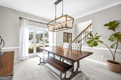 Welcome home to this 6-bedroom, 4-bath home tucked away on a on The Golf Club of Georgia in Georgia - for sale on GolfHomes.com, golf home, golf lot