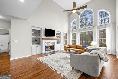 Welcome home to this 6-bedroom, 4-bath home tucked away on a on The Golf Club of Georgia in Georgia - for sale on GolfHomes.com, golf home, golf lot