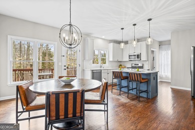 Welcome home to this 6-bedroom, 4-bath home tucked away on a on The Golf Club of Georgia in Georgia - for sale on GolfHomes.com, golf home, golf lot