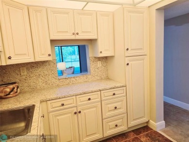 All ages welcome here! Located on the 1st floor, this 1 bedroom on Colony West Country Club in Florida - for sale on GolfHomes.com, golf home, golf lot