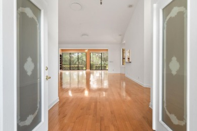 Discover the perfect blend of privacy, luxury, and nature in on Harbour Ridge Yacht and Country Club in Florida - for sale on GolfHomes.com, golf home, golf lot