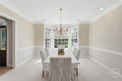 Enjoy panoramic golf course and lagoon views from this beautiful on The Landings Club - Oakridge in Georgia - for sale on GolfHomes.com, golf home, golf lot