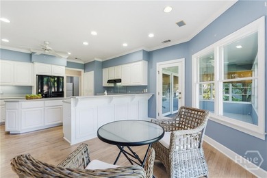 Enjoy panoramic golf course and lagoon views from this beautiful on The Landings Club - Oakridge in Georgia - for sale on GolfHomes.com, golf home, golf lot